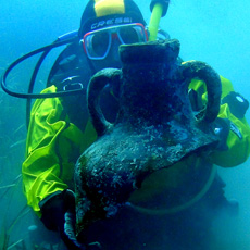 Student with a Roman Amphorae in Sanitja Port