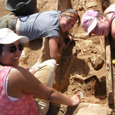 Students digging a Roman tomb