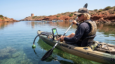 Student in canoe during harbour survey in Menorca