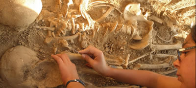 Student working in Sanisera Necropolis